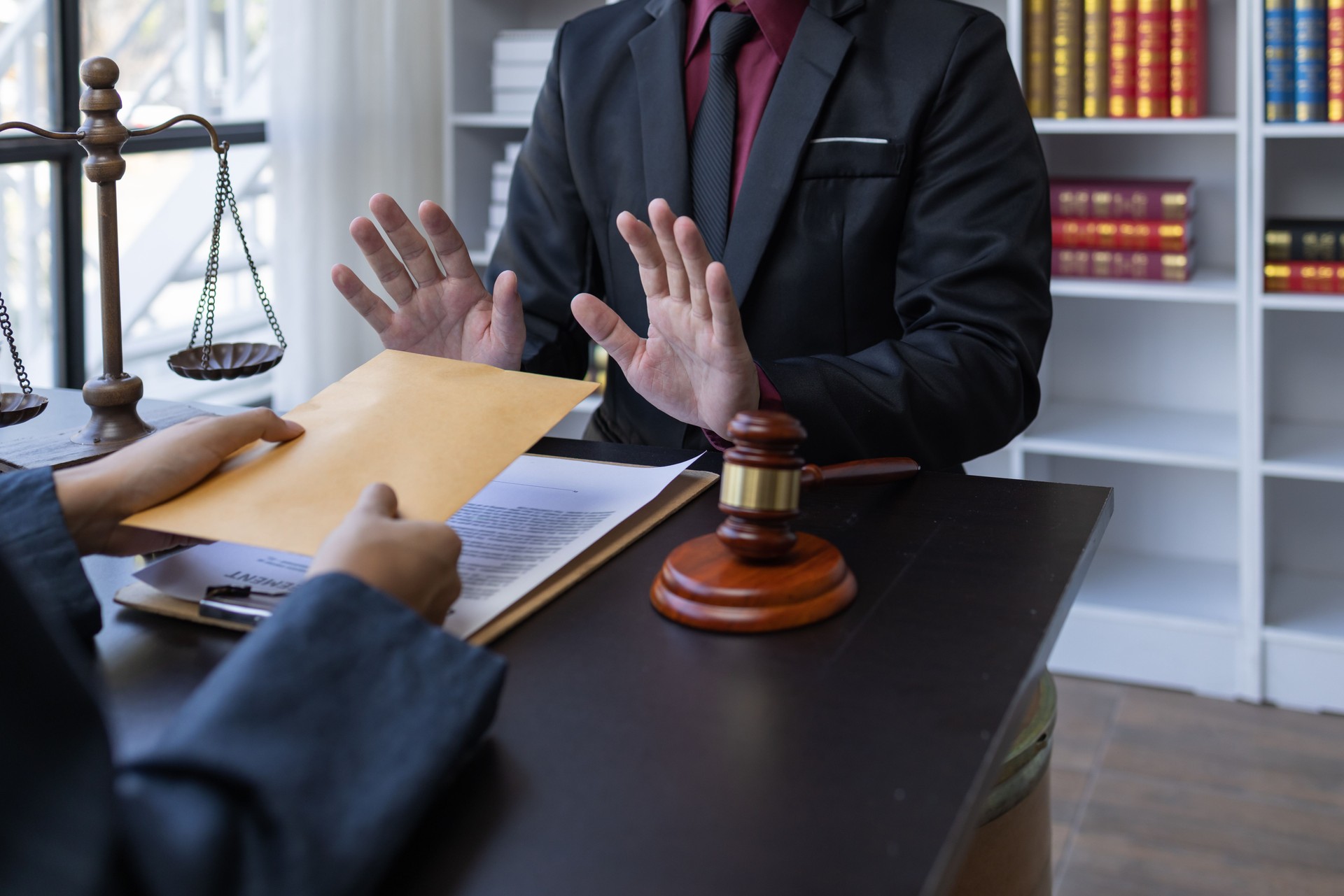 Corruption and Bribery,Businessman manager refusing receive money from Business man passing money dollar bills to deal contract.Corruption and anti bribery concept.
